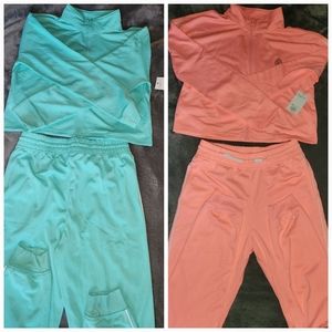 Brand new pair of Tek Gear track suits Xl (14-16)